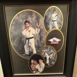 A Brantley's Revolution Training and Martial Arts - Me in my black belt photos way way way back in the day with Mr.Brantley.