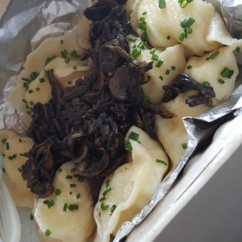Baba's Pierogies - With a topping of mushrooms - Modern European Near Me - Brooklyn, New York