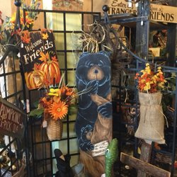 Seaford Florist - Wooden carvings, wall hangings, and silk wreaths
