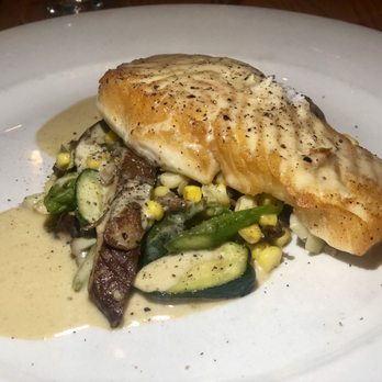 44 & X Hell's Kitchen - Sautéed halibut, caramelizad Brussels sprouts, baby zucchini, asparagus, roasted sweet corn, shiitake and maitake mushrooms - New American Near Me - New York, New York