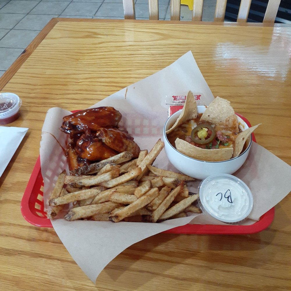 High Speed Wings - a basket of fries and a sandwich - Chicken Wings Near Me - Duluth, Georgia High Speed Wings - a basket of fries and a sandwich - Chicken Wings Near Me - Duluth, Georgia