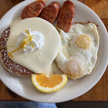 Moke’s Bread And Breakfast - Sunset breakfast with 2 mini Lillikoi pancakes - Breakfast & Brunch Near Me - Honolulu, Hawaii Moke’s Bread And Breakfast - Sunset breakfast with 2 mini Lillikoi pancakes - Breakfast & Brunch Near Me - Honolulu, Hawaii