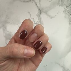 Bliss Nails - I've never had a gel manicure peel off and last less than 5 days! My other hand looks the same.
