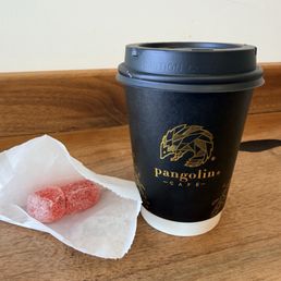 Pistachio latte with complimentary sour raspberry Turkish delights Pistachio latte with complimentary sour raspberry Turkish delights