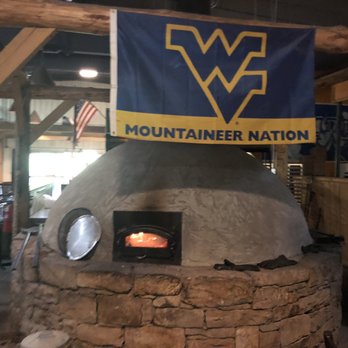 West Virginia Brewing - a brick oven with a mountaineer nation sign on it - Breweries Near Me - Morgantown, West Virginia West Virginia Brewing - a brick oven with a mountaineer nation sign on it - Breweries Near Me - Morgantown, West Virginia