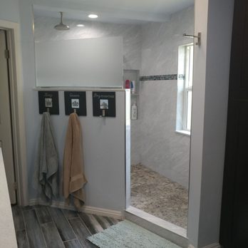 Best Kitchen & Bath - Walk-in shower with waterfall shower head and Pebble floor - General Contractors Near Me - Monterey Park, California Best Kitchen & Bath - Walk-in shower with waterfall shower head and Pebble floor - General Contractors Near Me - Monterey Park, California