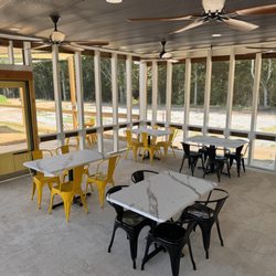 The Busted Biscuit - Take your breakfast, lunch & dinner outdoors with our screened-in patio offers a breezy, relaxed space.