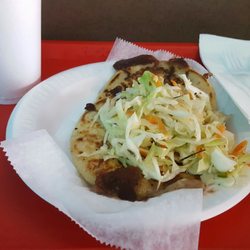 El Nopal - Two pupusas filled with beans and cheese with Tamarindo drink. Really authentic taste and environment.