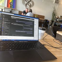 a laptop on a table a laptop on a table