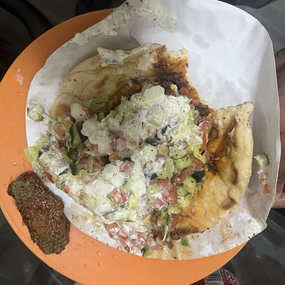 Jerk chicken gyro and one chili wing