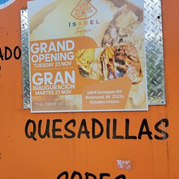 a sign on the side of a food truck a sign on the side of a food truck