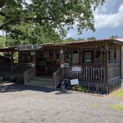 Wagon Wheel BBQ - This is the place.  There's seating on the porch and another covered seating area beside it.