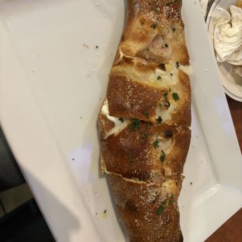 Los Primos Restaurant and Bar - Eggplant Stromboli - Pizza Near Me - Winston-Salem, North Carolina Los Primos Restaurant and Bar - Eggplant Stromboli - Pizza Near Me - Winston-Salem, North Carolina