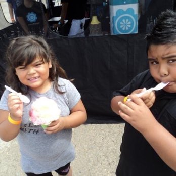 Snowflakes - Two happy kiddos enjoying their shaved ice topped with condensed milk. - Shaved Ice Near Me - Artesia, California Snowflakes - Two happy kiddos enjoying their shaved ice topped with condensed milk. - Shaved Ice Near Me - Artesia, California