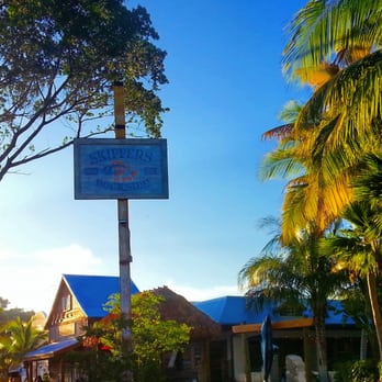 Skipper's Dockside - Sunsets over the entrance - Seafood Near Me - Key Largo, Florida Skipper's Dockside - Sunsets over the entrance - Seafood Near Me - Key Largo, Florida