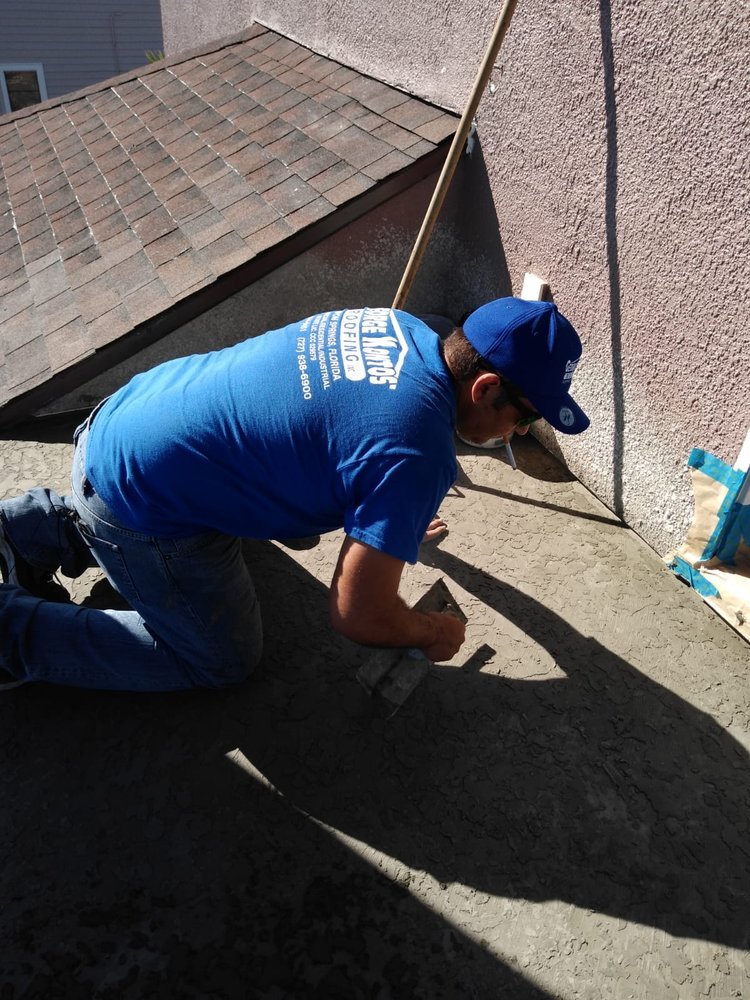 Slide of George Kontos Roofing