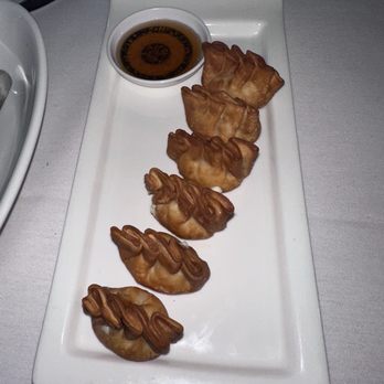 Orchid Thai Cuisine - Golden Purses: they're crab Rangoon but the shell was not very crispy and they weren't hot. Tasted like they sat out too long. - Thai Near Me - Winter Park, Florida Orchid Thai Cuisine - Golden Purses: they're crab Rangoon but the shell was not very crispy and they weren't hot. Tasted like they sat out too long. - Thai Near Me - Winter Park, Florida