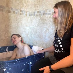 Holistic Family Doulas - Lara and me laughing during my contractions.