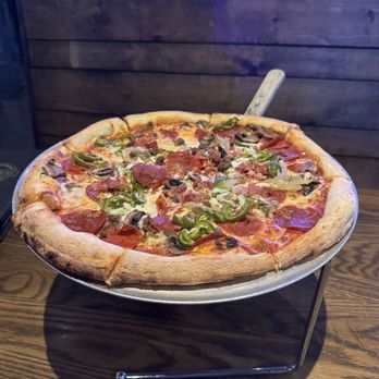On The Kirb - Meat on the Kirb-- mozzarella, pepperoni, italian sausage, bacon, ground beef, onions, bell peppers, jalapenos and mushrooms - Sports Bars Near Me - Houston, Texas
