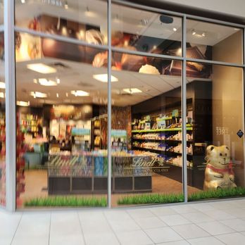 Lindt Chocolate Shop - a storefront with a teddy bear in the window - Candy Stores Near Me - Rosemont, Illinois
