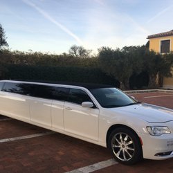 Charmed Limousine Service - The latest addition our fleet: an almost new Chrysler 300, 140" stretch, 10 passenger limousine with 10 seat belts in the passenger area!