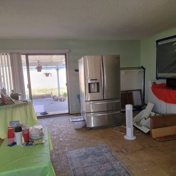Advanced Construction & Restoration - flood damaged living room - General Contractors Near Me - Fullerton, California