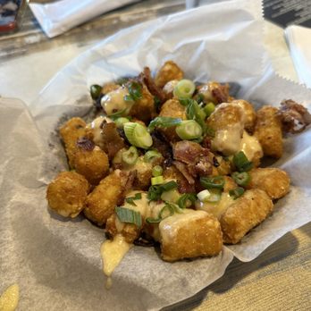 The Chubby Pickle - Tater tots with bacon - Sports Bars Near Me - Highlands, New Jersey The Chubby Pickle - Tater tots with bacon - Sports Bars Near Me - Highlands, New Jersey