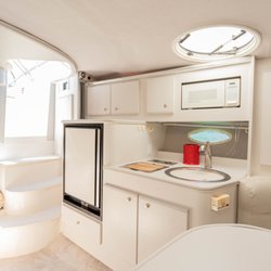 Lover Lips Yachts - Fridge, stove and sink.