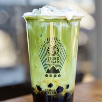 Tiger Sugar - a green tea drink in a plastic cup - Bubble Tea Near Me - Westminster, Colorado Tiger Sugar - a green tea drink in a plastic cup - Bubble Tea Near Me - Westminster, Colorado