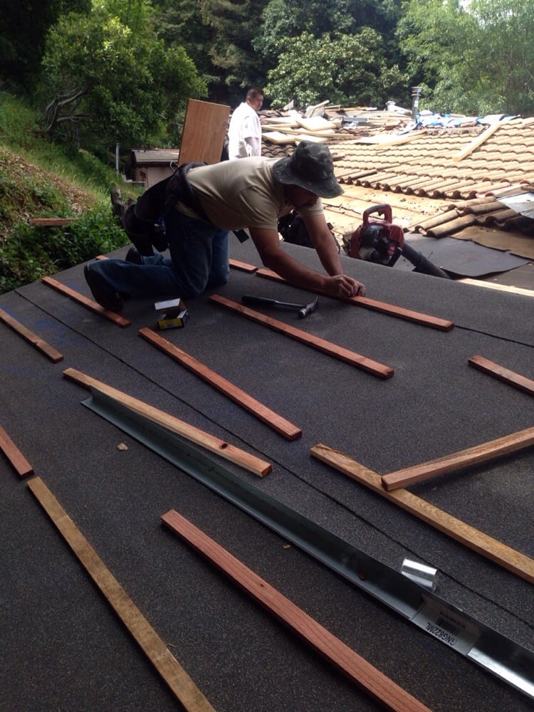 Slide of Gammalyn Roofing