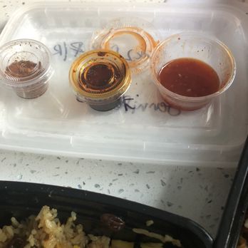 Thai Food Addict - House sauce on right and it's delicious . Chili flakes far left added to wonton soup was spot on! - Thai Near Me - Helmetta, New Jersey