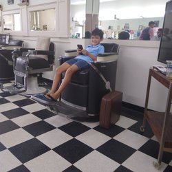 Charles Barber & Style Shop - Waiting for a great cut