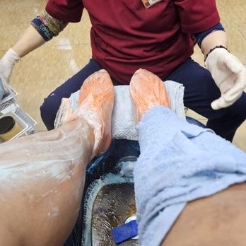 Joy Nails - Pedicure with hot towels and feet in hot wax. - Nail Salons Near Me - Galveston, Texas