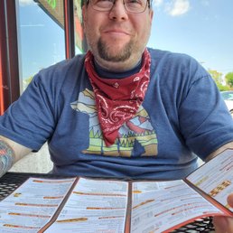 Joe looking over the vast menu - TOO many choices! Joe looking over the vast menu - TOO many choices!