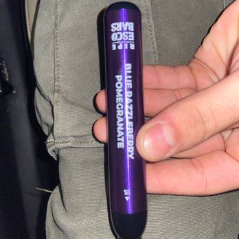 U-Smoke Vape Shop - a hand holding it - Vape Shops Near Me - Naperville, Illinois