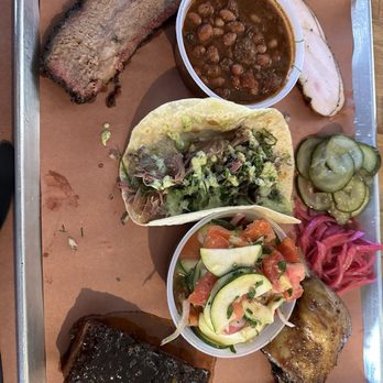 Interstellar BBQ - Brisket, turkey, peach tea glazed pork belly, sorghum glazed duck, pulled lamb taco. - Barbeque Near Me - Austin, Texas