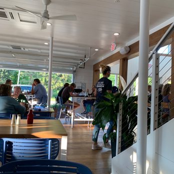 Red's Lakehouse - people sitting at tables in a restaurant - Bars Near Me - Marblehead, Ohio Red's Lakehouse - people sitting at tables in a restaurant - Bars Near Me - Marblehead, Ohio