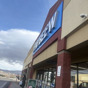 Five Below - Best Buy storefront with a large sign, glass doors, and two people outside, one with a shopping bag. - Toy Stores Near Me - Reno, Nevada