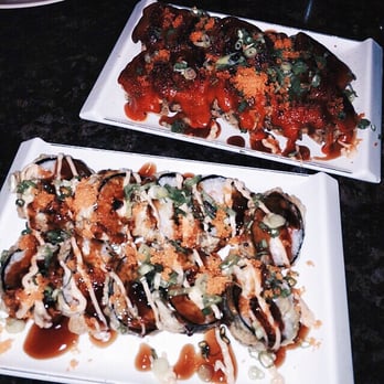 I Love Sushi - 1st roll (closest to you) is the black jack and 2nd roll (furthest and red sauce) is the Tokyo Mafia - Sushi Bars Near Me - Clovis, California I Love Sushi - 1st roll (closest to you) is the black jack and 2nd roll (furthest and red sauce) is the Tokyo Mafia - Sushi Bars Near Me - Clovis, California