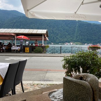 Albergo Ristorante Pizzeria Della Posta - Two of the four luxurious dining areas - Italian Near Me - Morcote, TI