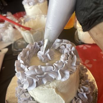 Mochinut - Harvey - Putting some finishing touches on my cake with piping bag. - Donuts Near Me - Harvey, Louisiana Mochinut - Harvey - Putting some finishing touches on my cake with piping bag. - Donuts Near Me - Harvey, Louisiana