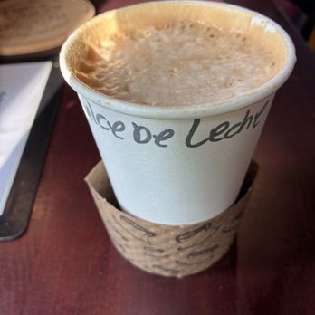 Tribute Coffee House - Dulce de Leche Latte (a mix of Milk, Evaporated Milk, and Sweetened Condensed Milk - medium 16 oz hot - $6.10) - Coffee & Tea Near Me - Garden Grove, California