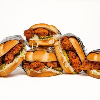 MrBeast Burger - a pile of fried chicken sandwiches - Food Delivery Services Near Me MrBeast Burger - a pile of fried chicken sandwiches - Food Delivery Services Near Me