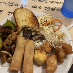 a plate of chinese food