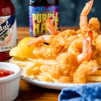 Orleans Seafood Kitchen - a plate of deep fried shrimp and fries - Seafood Near Me - Fulshear, Texas Orleans Seafood Kitchen - a plate of deep fried shrimp and fries - Seafood Near Me - Fulshear, Texas