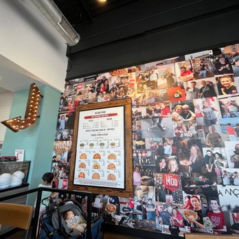 MOD Pizza - a wall covered with photos of customers - Pizza Near Me - Tempe, Arizona MOD Pizza - a wall covered with photos of customers - Pizza Near Me - Tempe, Arizona