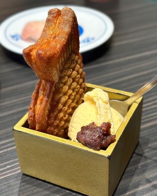 Kura Revolving Sushi Bar by null