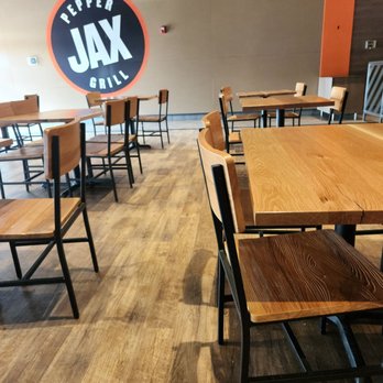 PepperJax Grill - tables and chairs in a restaurant - Cheesesteaks Near Me - Omaha, Nebraska PepperJax Grill - tables and chairs in a restaurant - Cheesesteaks Near Me - Omaha, Nebraska