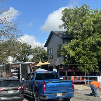 Progress Coffee + Beer - Outside view from the parking lot. - Food Trucks Near Me - Buda, Texas