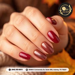 The One Nail Bar - Deep oranges and golden highlights shine this season. Create nails that reflect autumn's glow.  Book today